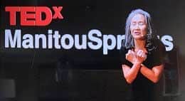 NA on stage at TEDx